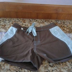 Board shorts with embroidry detail design